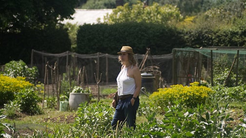 Visitor exploring the garden at Monk's House, East Sussex